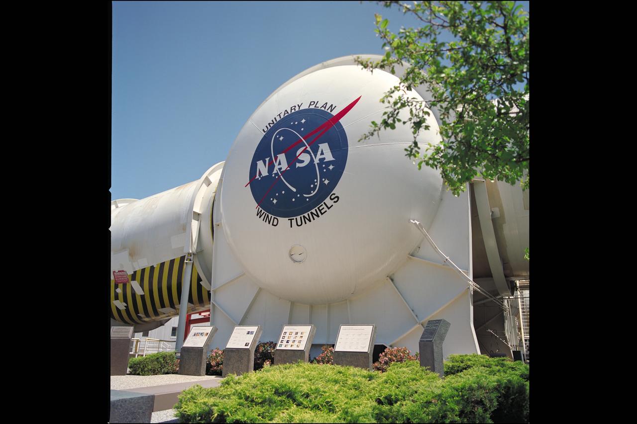 N-227 Unitary Plan Wind Tunnel with NASA 'Meatball' insignia over looking the National  Historical Landmark sites' commemorative plaques