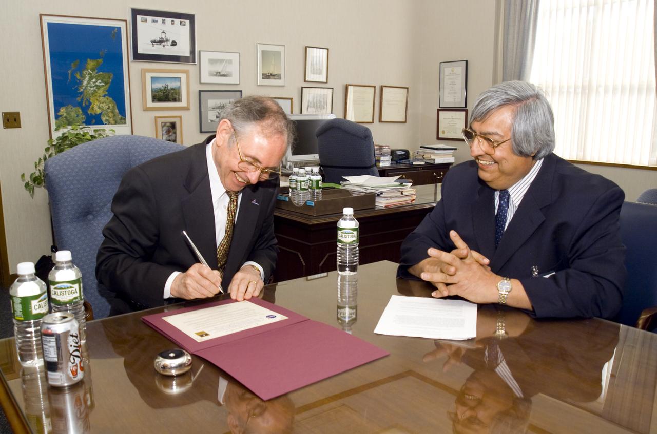 Dr. Henry McDonald signs MOU with National Hispanic University (NHU)  with Roberto Cruz, President NHU