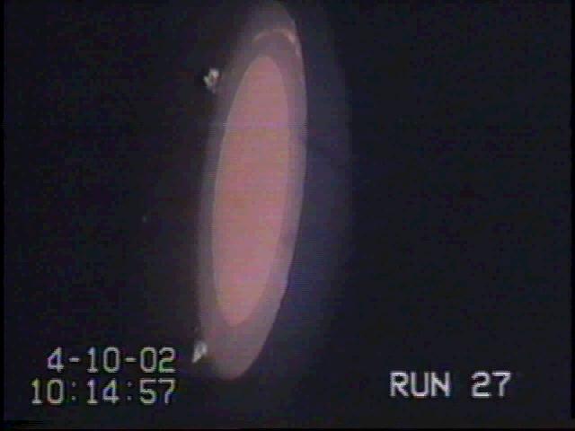 RCC (Reinforced Carbon-Carbon) Johnson Space Center model testing in Ames interactive Heating Facility IHF-127 (data run 27)