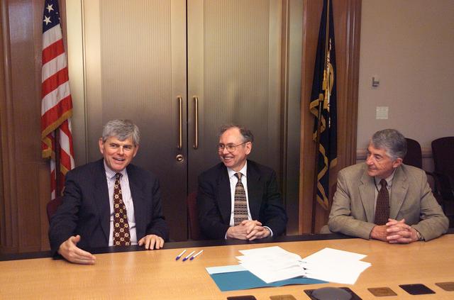 Memorandum of Understanding (MOU) to establish a Unmanned Aerial Vehicles (UAV) Applications Center at NASA Research Park (NRP) was signed into being by (L-R) John Bassett Clark University, Worcester, Mass.,  Dr. Henry McDonald, Director of Ames Research Center and Paul Coleman, Girvan Institute (a non-profit organization lockated in NASA Research Park).