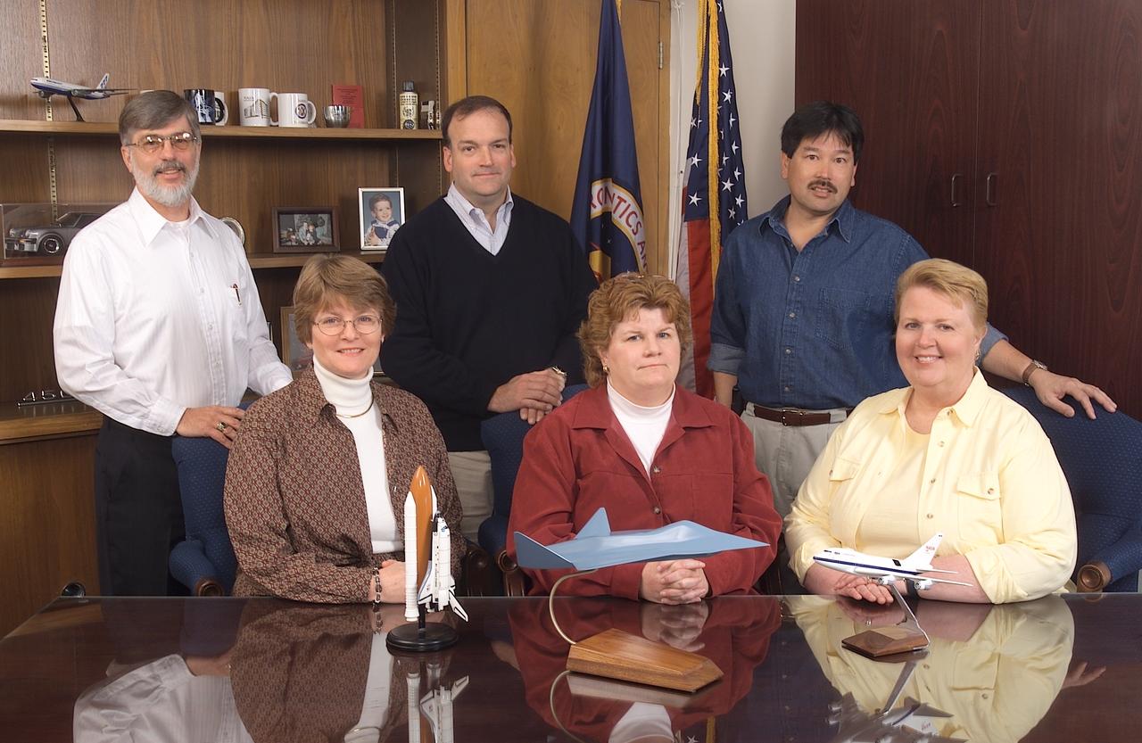 Acquisition Division (Code-JA)  staff with Branch Chiefs: Seated L-R; Connie Cunningham, Dee Morison, Carolyn LaFollette: Standing L-R; Gene Moses, Charles Duff, Daryl Wong