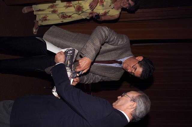 Technology Infusion Award (Code I) 'Golden Fish' presented by Steve Zornitzer to Dr. Irving C. Statler in recognition work resulting in the infusion of Performance Data Analysis and Reporting System (PDARS) technologies into the FAA Air Traffic Management System