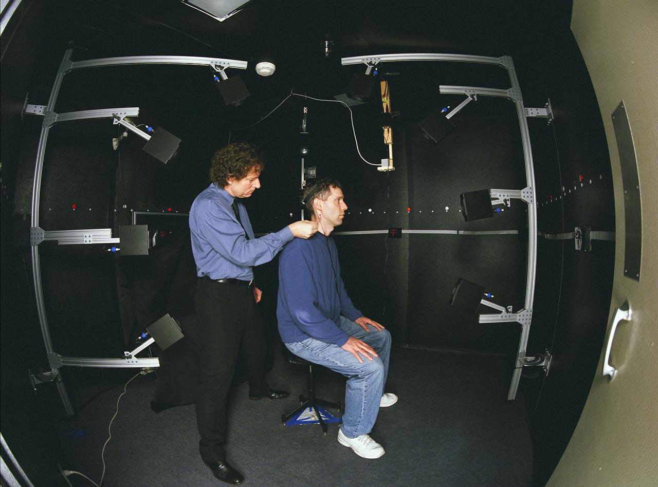 3-D Audio Laboratory N-262 (rm194) Human Factors Research. Tom Lee (subject) and Durand 'Randy' Begauldt in sound booth