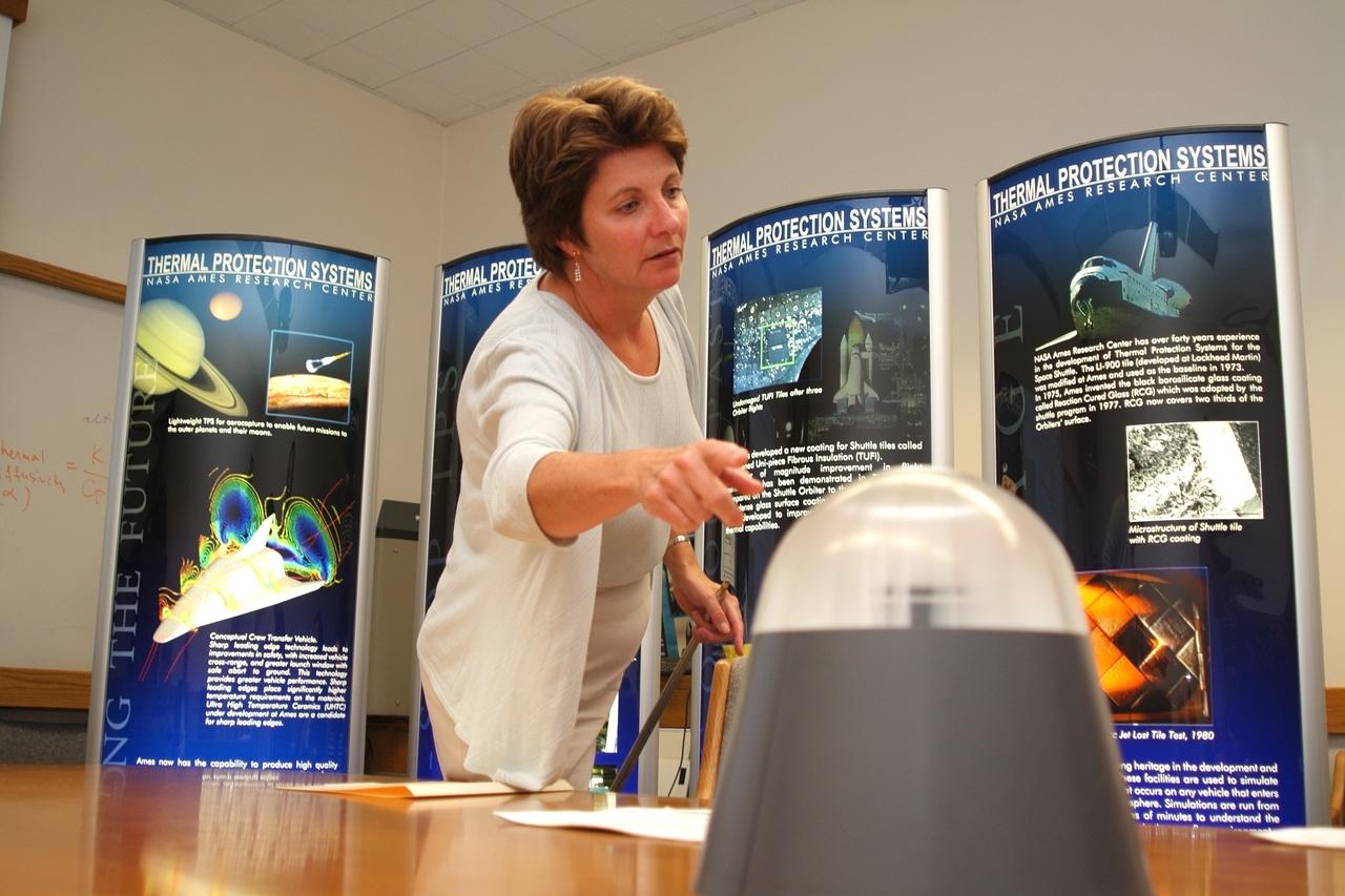 U. S. Congressman Culbertson, Texas and Mr John Webb, Webb & Associates visit and tour Ames Research Center with Center Director G. Scott Hubbard (pre-tour briefing at the Thermal Protection Facility - Arc Jet by Sylvia Johnson)