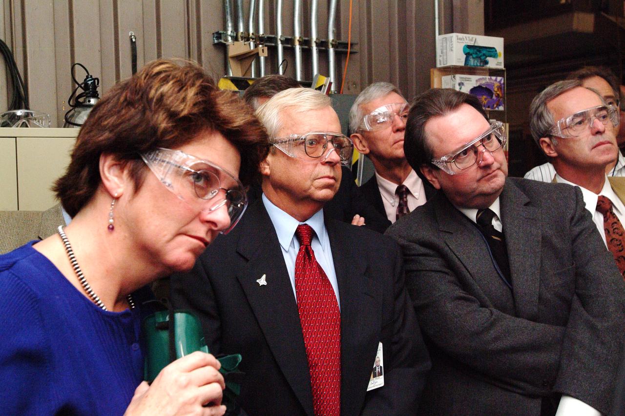 NASA Space Science Advisory Committee Chairman Ed Wiler (c) visit to Ames Research Center: on tour of the Arc Jet Facility with G. Scott Hubbard, Raj Venkatapathy and entourage.