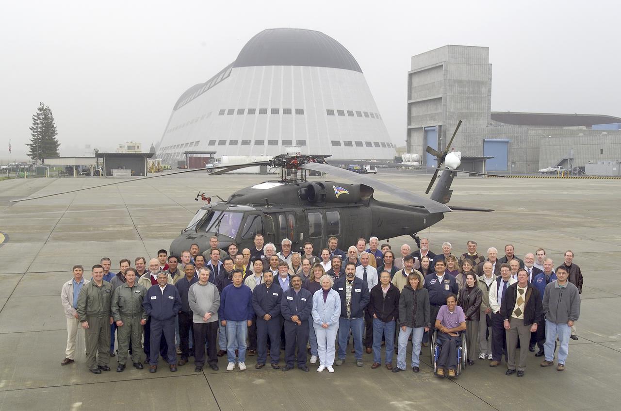FLIGHT CONTROL & COCKPIT INTEGRATION BRANCH (CODE-ARH) PERSONNEL IN FRONT OF RASCAL HELICOPTER