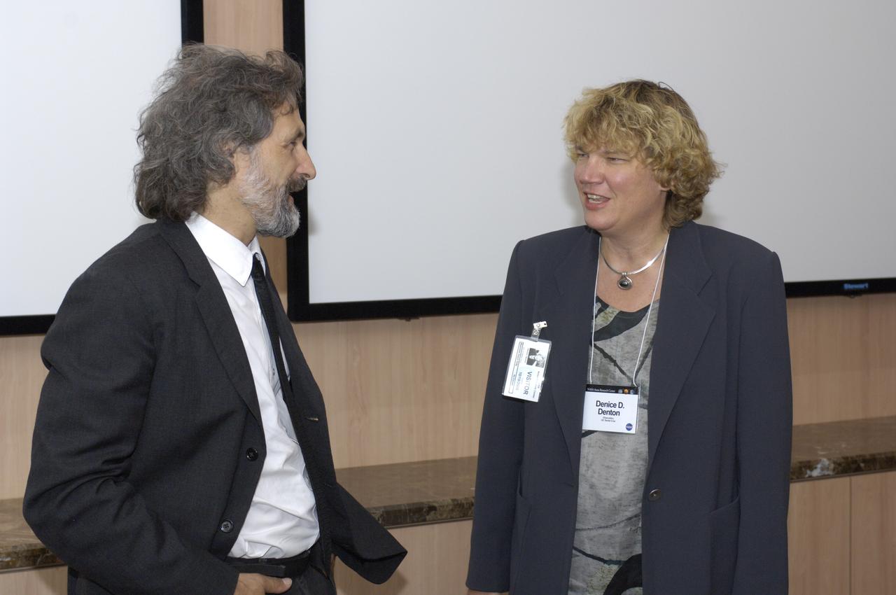 Universtiy of California Santa Cruz Chancellor Denice Denten (and other guests) visit NASA Ames Research Center to meet with Directors and have a briefing on Ames Projects and Programs. Jonathan Trent, Ames Research Scientist, Bioengineering Branch (L) and  Denice Denton, Chancellor of UCSC (R)