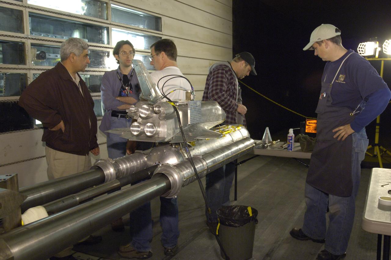 Space Shuttle 3% scale model to analyze removal of PAL ramp and other effects in the 11 ft. w.t. from left to right Rabi Meha, Ames AO, Grey Potts, Boeing, Bill Van Zuylen, Ames AO, Chris Radbourne and Rob Kornienko