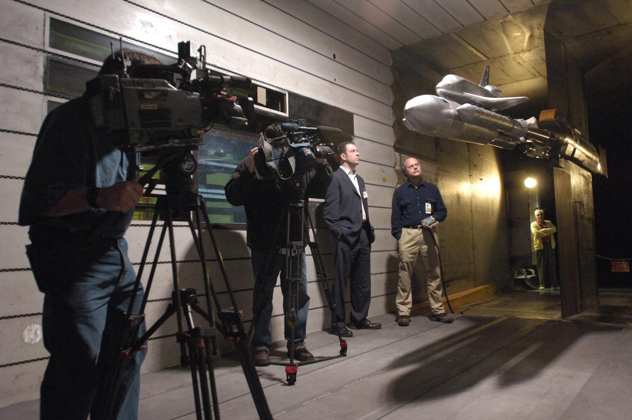 The media invited to view the 3% Space Shuttle model mounted in the Ames 11ft .w.t. with Scott Budman, NBC Channel 11 News and Jim Strong, Ames Aeronautics
