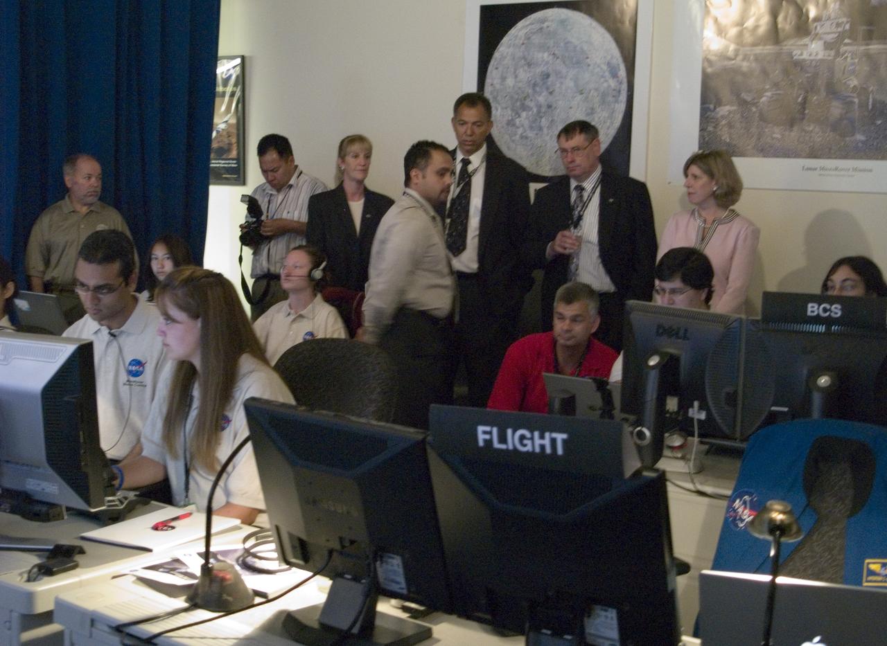 Spaceward Bound Program in Atacama Desert; shown here is a realtime webcast from Yungay, Chile vis satellite involving NASA Scientists and seven NASA Explorer school teachers. On the Ames end we find the Girl Scouts Space cookines robotic team. The robot nicknamed Zoe is looking for life in extreme environments in preparation for what might be encounter on Mars. see full text on the NASA-Ames News - Research # 04-91AR