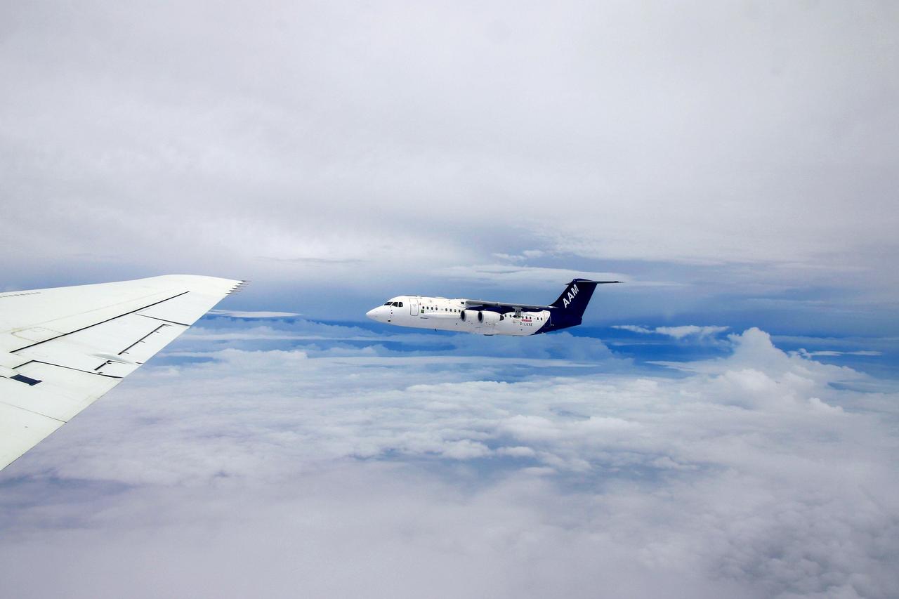 DC-8 NAMMA (NASA African Monson Multidisciplinary Analyses) MISSION TO CAPE VERDE, AFRICA Formation flight with the U.K's Meteorological Office's BAE-146 Research aircraft off the coast of West Africa