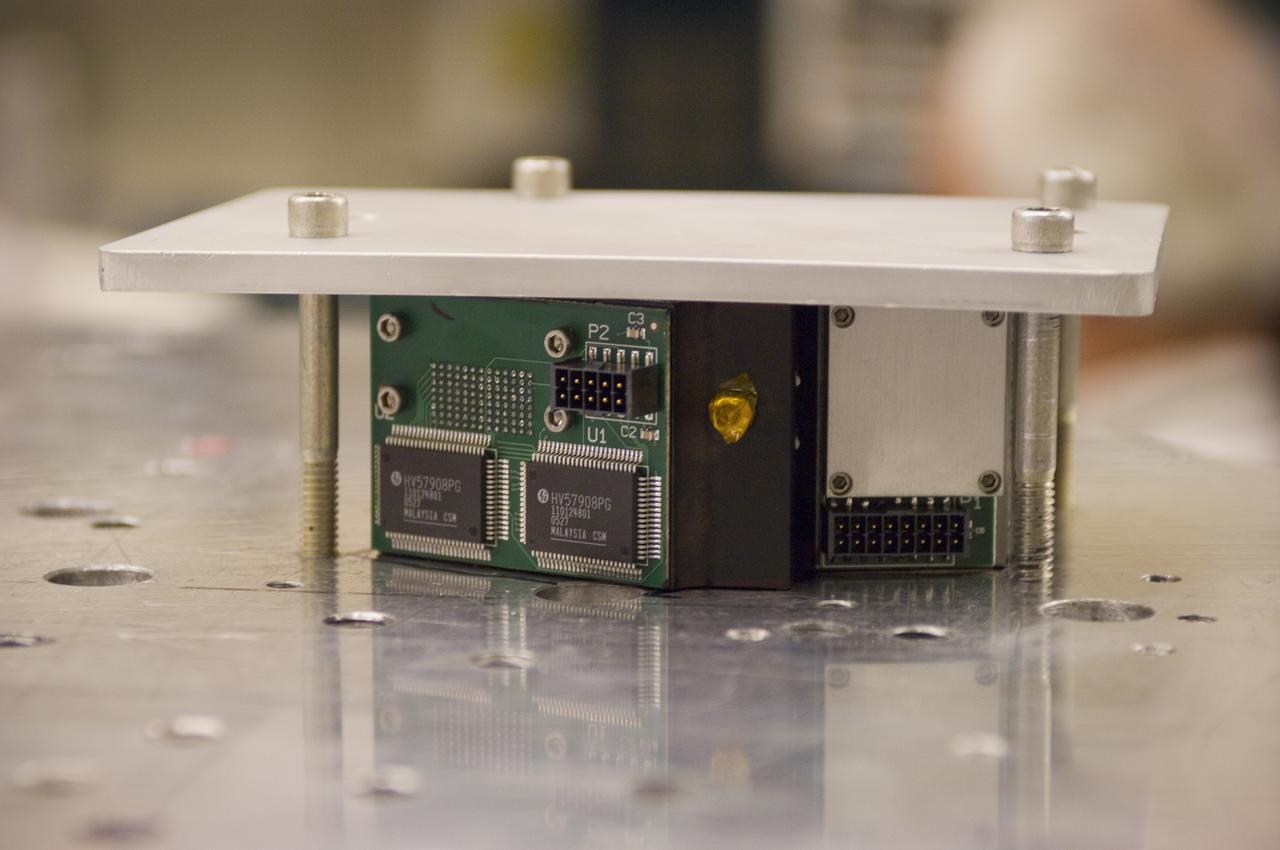 LCROSS (Lunar Crater Observation Sensing Satellite) Near InfraRed Spectrometer shake test in Ames N-244 high bay EEL Lab - Spectrometer on shake table