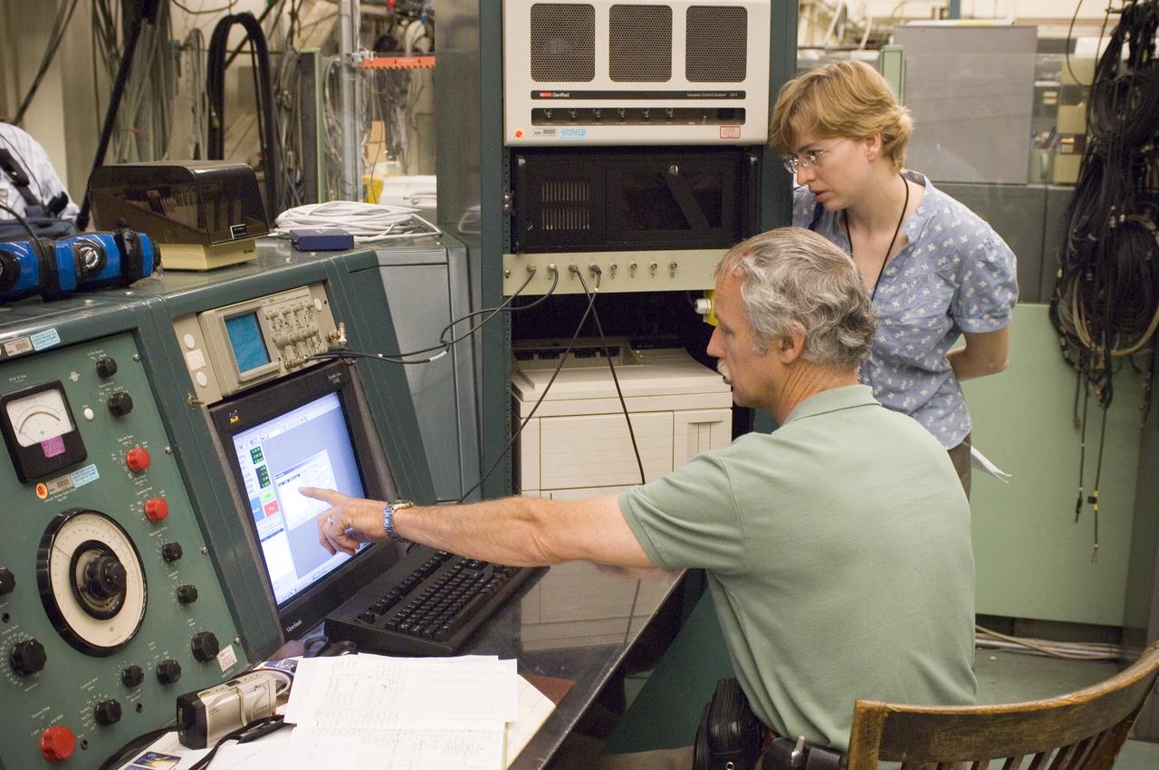 LCROSS (Lunar Crater Observation Sensing Satellite) Near InfraRed Spectrometer shake test in Ames N-244 high bay EEL Lab - with Lynn Hofland, Ames EEL lab) and Kimberly Ennico, LCROSS payload scientist