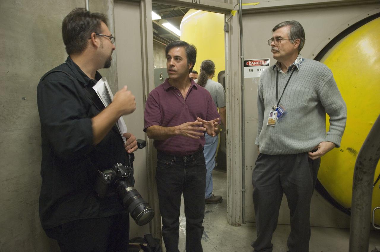 Ames holds a Media Day at the Hypervelocity Free Flight facility where Ames is conducting high-speed tests of small models of the agency's new Orion CEV  to learn about stability during flight.  The hypervelocity test facility uses a gun to shoot Orion models between 0.5 and l.5 inches (1.25 - 3.75 centimeters in diameter. The facility can conduct experiments with speeds up to 19,000 miles per hour (30,400 kilometers per hour) with John Bluck (Ames PAO) and Chuck Cornelison Ames Engineer