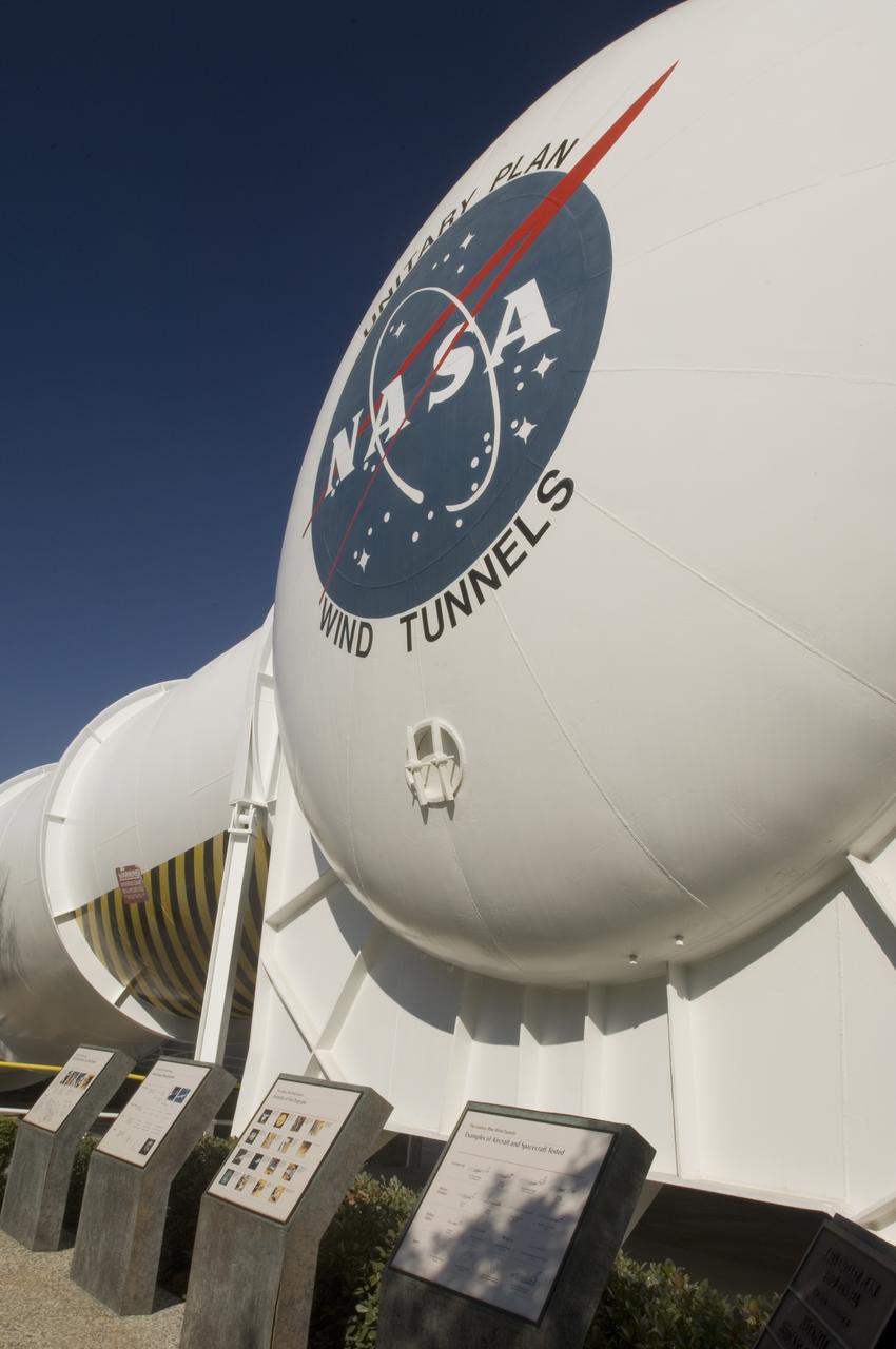Ames and Moffett Field (MFA) historical sites and memorials Unitary Plan Wind Tunned plaza; display and historical site plaques with the NASA logo on the Wind Tunnel valve as a backdrop.