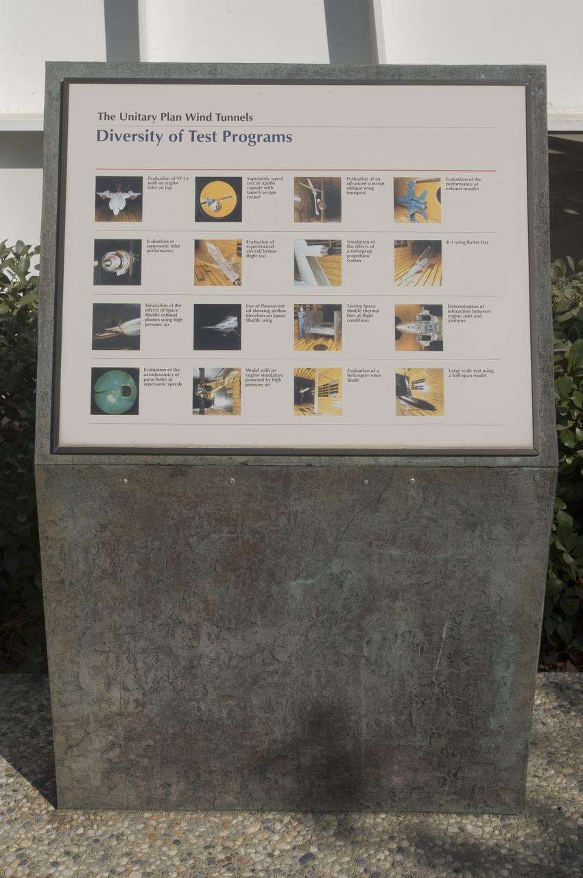 Ames and Moffett Field (MFA) historical sites and memorials Unitary Plan Wind Tunned plaza; display and historical site plaques with the NASA logo on the Wind Tunnel valve as a backdrop.