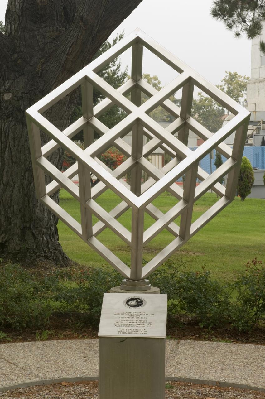 Ames and Moffett Field (MFA) historical sites and memorials Time capsule and cube display ot courner of DeFrance and King Road (50th year anniversary placement), with detail on brass plaque in walkway (40th year anniversary placement)