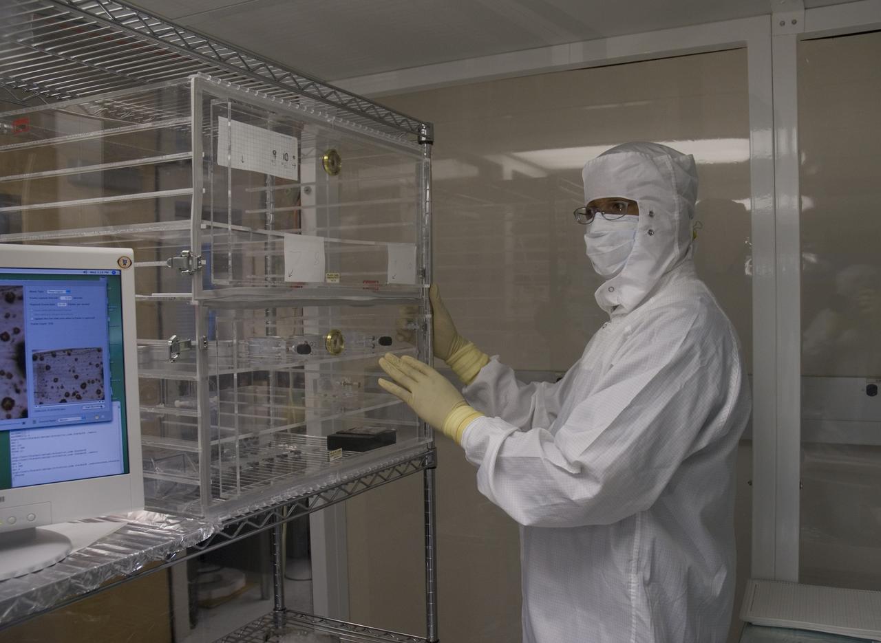 Stardust sample analysis @ UC Berkeley clean room  with Dr Scott Sandford, NASA Ames Astrophysicist - mission samples provided to UC Berkeley for analysis by NASABerkeley researcher Zack Gainsforth working with sample encased in aerogel