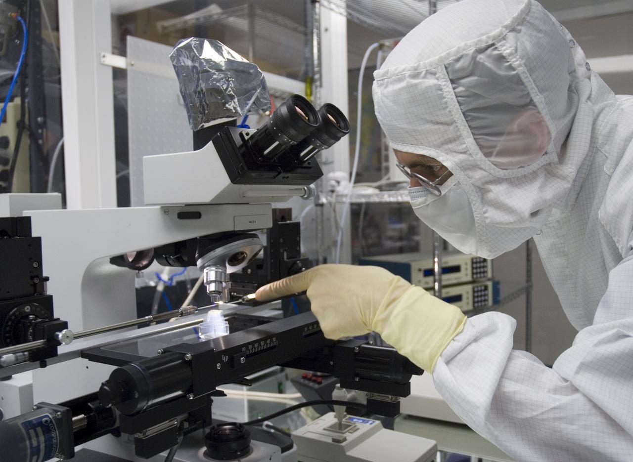 Stardust sample analysis @ UC Berkeley clean room - mission samples provided to UC Berkeley for analysis by NASA Berkeley researcher Chris Snead working with sample encased in aerogel