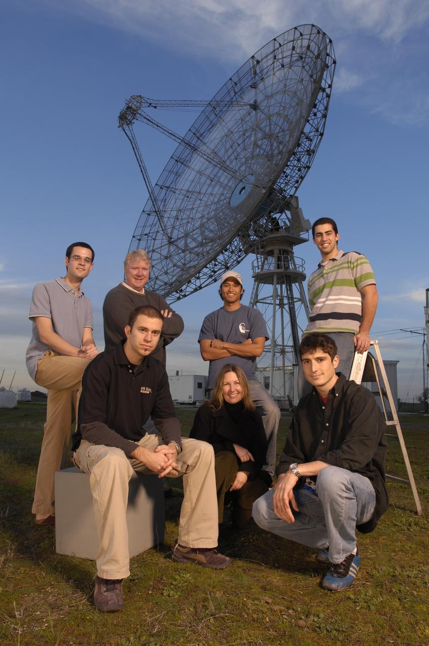 Ignacio Mas, Giovanni Minetti, Phelps Williams, Mike Rasay, Paul Mahacek, Chris Kitts (all from Santa Clara University) and Karolyn Ronzono, NASA Ames at GeneSat tracking dish at Stanford University in Northern California
