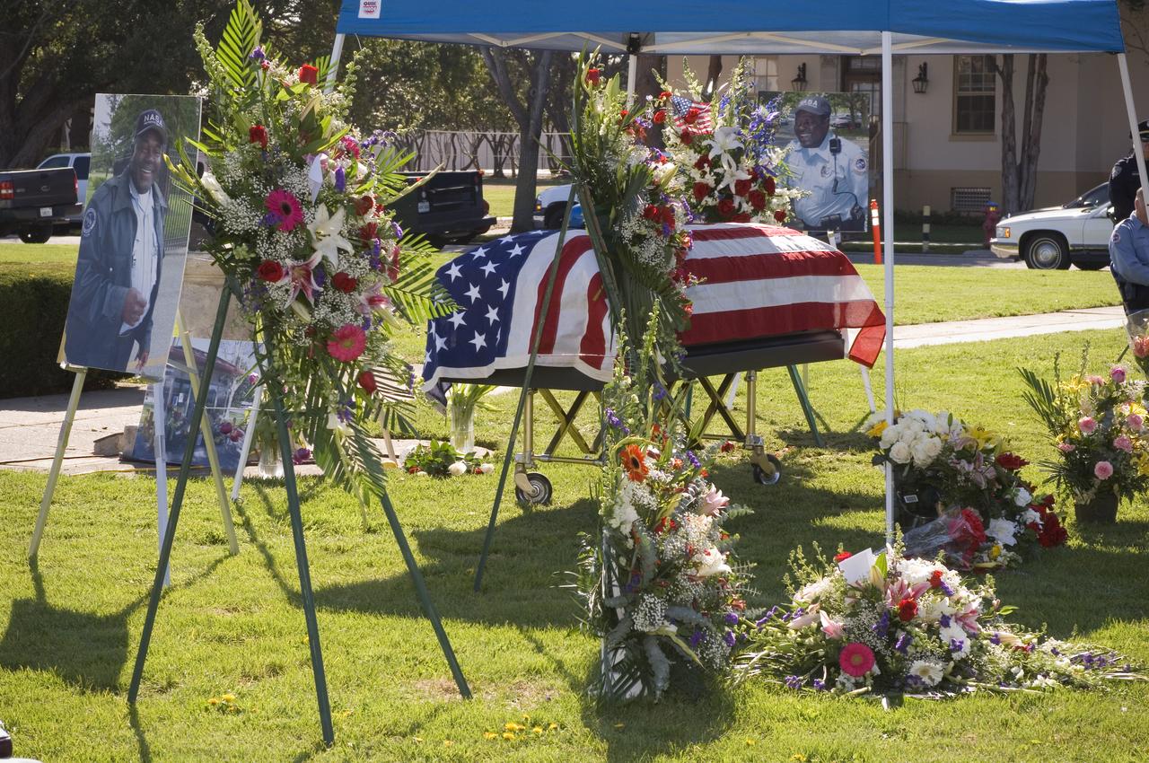 Memorial services for Ames Security Guard Johnny Green. funeral services on the NRP parade ground. Eugolies presented b Chris Christensen, Deputy Center Director, Ames Research Center, Robert Dlci, Cief, Protective Services, Roger Higby, Lt., Ames Protectives serices, Cynthia Green, Daughter, Sloan Thompson, Granddaughter - Awarding of California Commendation Medal, Col. Amos Bagdasarian 129th Rescue Wing, CA Ang, Military Shadow Box, CPO Mike Di Santo, USN, Presentation of American Flags, Robert Dolci