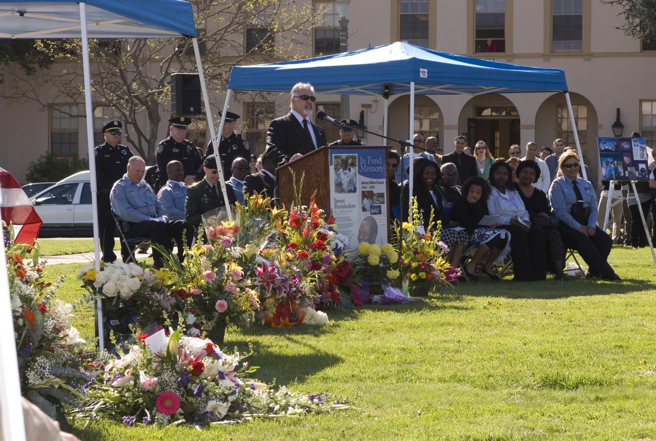 Memorial services for Ames Security Guard Johnny Green. funeral services on the NRP parade ground. Eugolies presented b Chris Christensen, Deputy Center Director, Ames Research Center, Robert Dlci, Cief, Protective Services, Roger Higby, Lt., Ames Protectives serices, Cynthia Green, Daughter, Sloan Thompson, Granddaughter - Awarding of California Commendation Medal, Col. Amos Bagdasarian 129th Rescue Wing, CA Ang, Military Shadow Box, CPO Mike Di Santo, USN, Presentation of American Flags, Robert Dolci