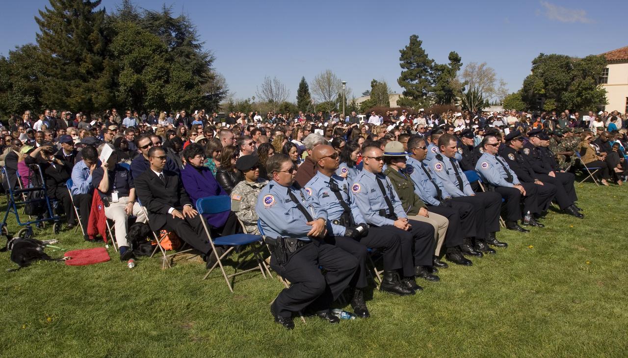 Memorial services for Ames Security Guard Johnny Green. funeral services on the NRP parade ground. Eugolies presented b Chris Christensen, Deputy Center Director, Ames Research Center, Robert Dlci, Cief, Protective Services, Roger Higby, Lt., Ames Protectives serices, Cynthia Green, Daughter, Sloan Thompson, Granddaughter - Awarding of California Commendation Medal, Col. Amos Bagdasarian 129th Rescue Wing, CA Ang, Military Shadow Box, CPO Mike Di Santo, USN, Presentation of American Flags, Robert Dolci