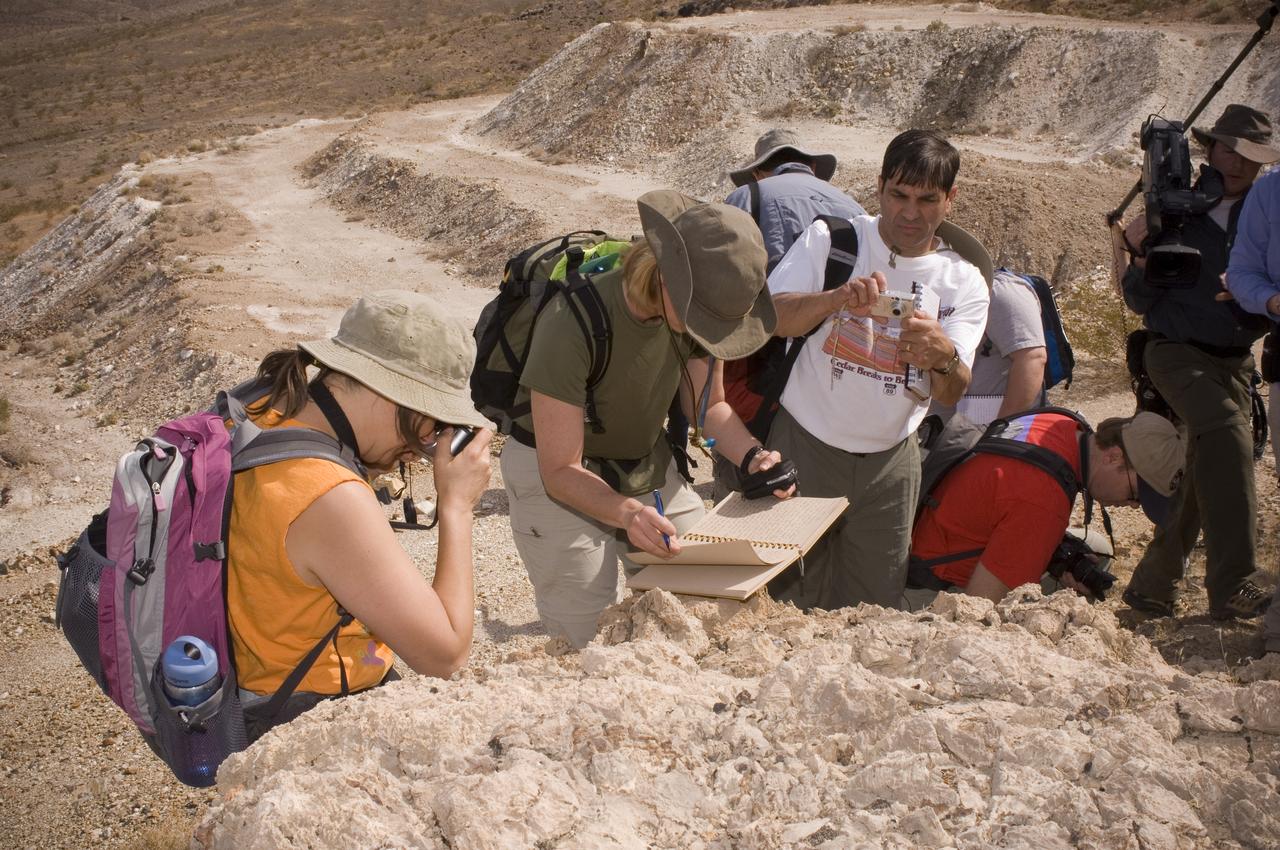 Spaceward Bound event in the Mojave Deser , CA (an outreach exercise) with Dr Chris McKay and Ames Education department personnel Brian Day, Barbara Bazar and a accompaning  (learning for the the classroom)  team of teachers will be studying side-by-side with NASA scientists who search for life in extreme environments, closely approximating what they expect to find on other planets. Why the Mojave -- an inhospitable, sun-drenched spot in the California Desert? This natural setting presents scientists with opportunities to study environments that are analogous to what explorers will find on the Moon and Mars. Teachers and scientists will perform scientific fieldwork in lunar geology, Mars astrobiology, Mars geology, and issues of temperature and solar inundation and radiation. for additional information and Outreach projects  see http://quest.arc.nasa.gov/