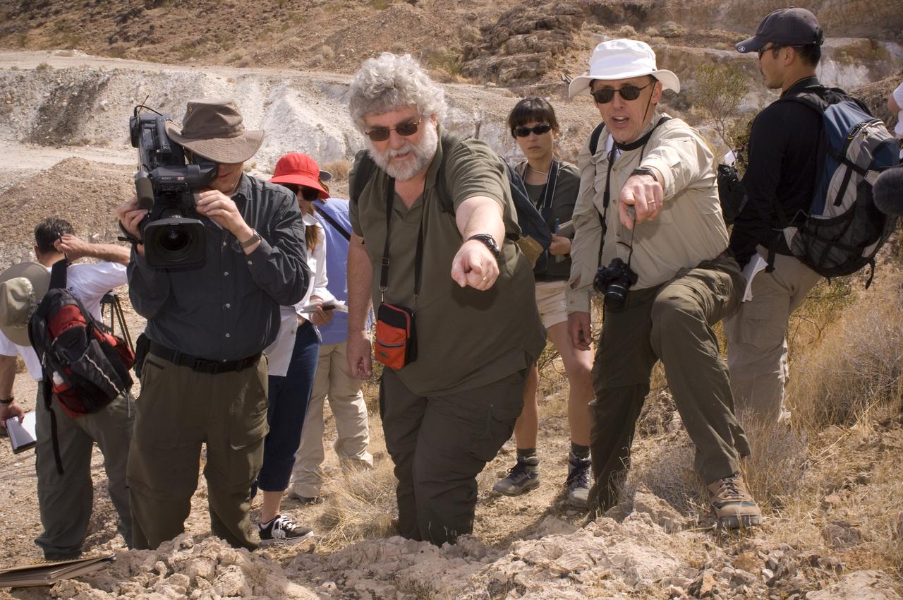 Spaceward Bound event in the Mojave Deser , CA (an outreach exercise) with Dr Chris McKay and Ames Education department personnel Brian Day, Barbara Bazar and a accompaning  (learning for the the classroom)  team of teachers will be studying side-by-side with NASA scientists who search for life in extreme environments, closely approximating what they expect to find on other planets. Why the Mojave -- an inhospitable, sun-drenched spot in the California Desert? This natural setting presents scientists with opportunities to study environments that are analogous to what explorers will find on the Moon and Mars. Teachers and scientists will perform scientific fieldwork in lunar geology, Mars astrobiology, Mars geology, and issues of temperature and solar inundation and radiation. for additional information and Outreach projects  see http://quest.arc.nasa.gov/