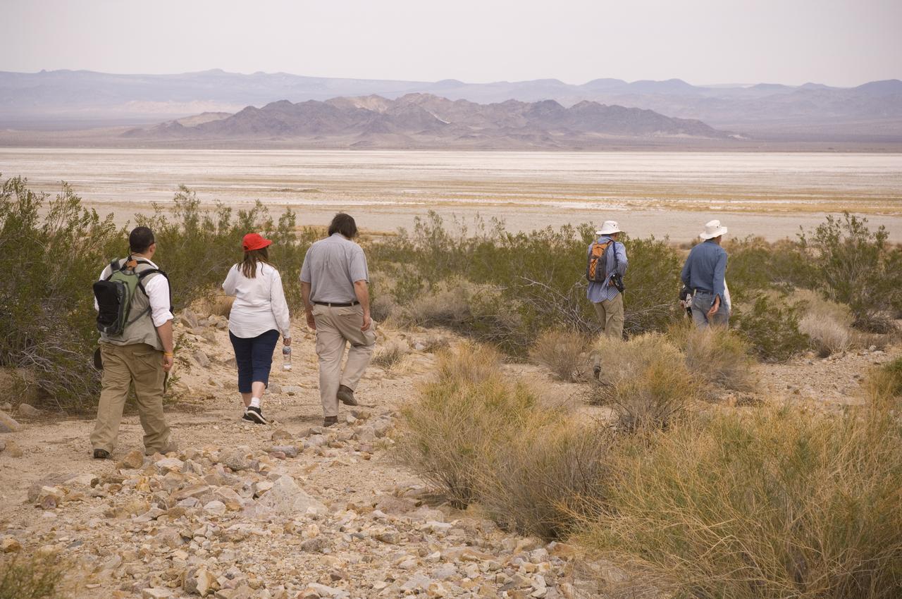 Spaceward Bound event in the Mojave Deser , CA (an outreach exercise) with Dr Chris McKay and Ames Education department personnel Brian Day, Barbara Bazar and a accompaning  (learning for the the classroom)  team of teachers will be studying side-by-side with NASA scientists who search for life in extreme environments, closely approximating what they expect to find on other planets. Why the Mojave -- an inhospitable, sun-drenched spot in the California Desert? This natural setting presents scientists with opportunities to study environments that are analogous to what explorers will find on the Moon and Mars. Teachers and scientists will perform scientific fieldwork in lunar geology, Mars astrobiology, Mars geology, and issues of temperature and solar inundation and radiation. for additional information and Outreach projects  see http://quest.arc.nasa.gov/