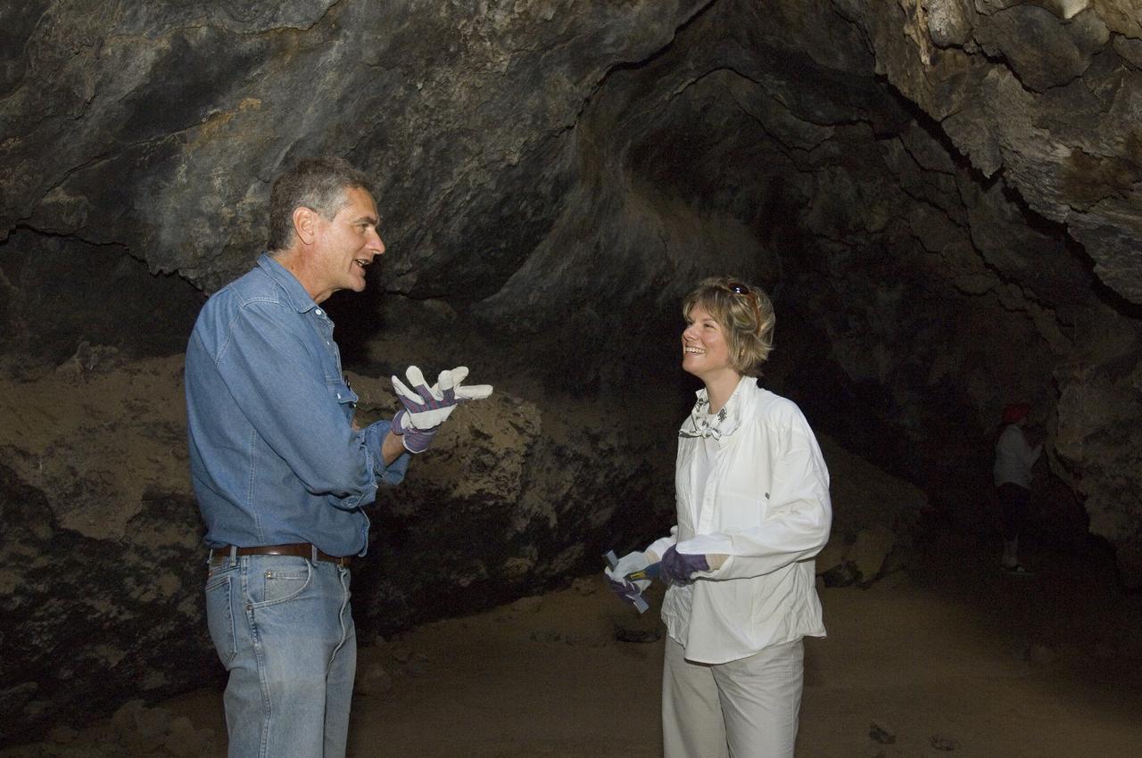 Spaceward Bound event in the Mojave Deser , CA (an outreach exercise) with Dr Chris McKay and Ames Education department personnel Brian Day, Barbara Bazar and a accompaning  (learning for the the classroom)  team of teachers will be studying side-by-side with NASA scientists who search for life in extreme environments, closely approximating what they expect to find on other planets. Why the Mojave -- an inhospitable, sun-drenched spot in the California Desert? This natural setting presents scientists with opportunities to study environments that are analogous to what explorers will find on the Moon and Mars. Teachers and scientists will perform scientific fieldwork in lunar geology, Mars astrobiology, Mars geology, and issues of temperature and solar inundation and radiation. for additional information and Outreach projects  see http://quest.arc.nasa.gov/ shown here are Dr Chris McKay and Monika Kress, Professor of Astronomy at San Jose State University