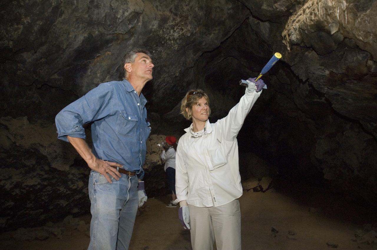 Spaceward Bound event in the Mojave Deser , CA (an outreach exercise) with Dr Chris McKay and Ames Education department personnel Brian Day, Barbara Bazar and a accompaning  (learning for the the classroom)  team of teachers will be studying side-by-side with NASA scientists who search for life in extreme environments, closely approximating what they expect to find on other planets. Why the Mojave -- an inhospitable, sun-drenched spot in the California Desert? This natural setting presents scientists with opportunities to study environments that are analogous to what explorers will find on the Moon and Mars. Teachers and scientists will perform scientific fieldwork in lunar geology, Mars astrobiology, Mars geology, and issues of temperature and solar inundation and radiation. for additional information and Outreach projects  see http://quest.arc.nasa.gov/ shown here are Dr Chris McKay and Monika Kress, Professor of Astronomy at San Jose State University