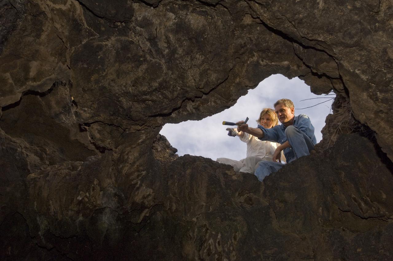 Spaceward Bound event in the Mojave Deser , CA (an outreach exercise) with Dr Chris McKay and Ames Education department personnel Brian Day, Barbara Bazar and a accompaning  (learning for the the classroom)  team of teachers will be studying side-by-side with NASA scientists who search for life in extreme environments, closely approximating what they expect to find on other planets. Why the Mojave -- an inhospitable, sun-drenched spot in the California Desert? This natural setting presents scientists with opportunities to study environments that are analogous to what explorers will find on the Moon and Mars. Teachers and scientists will perform scientific fieldwork in lunar geology, Mars astrobiology, Mars geology, and issues of temperature and solar inundation and radiation. for additional information and Outreach projects  see http://quest.arc.nasa.gov/ shown here are Dr Chris McKay and Monika Kress, Professor of Astronomy at San Jose State University