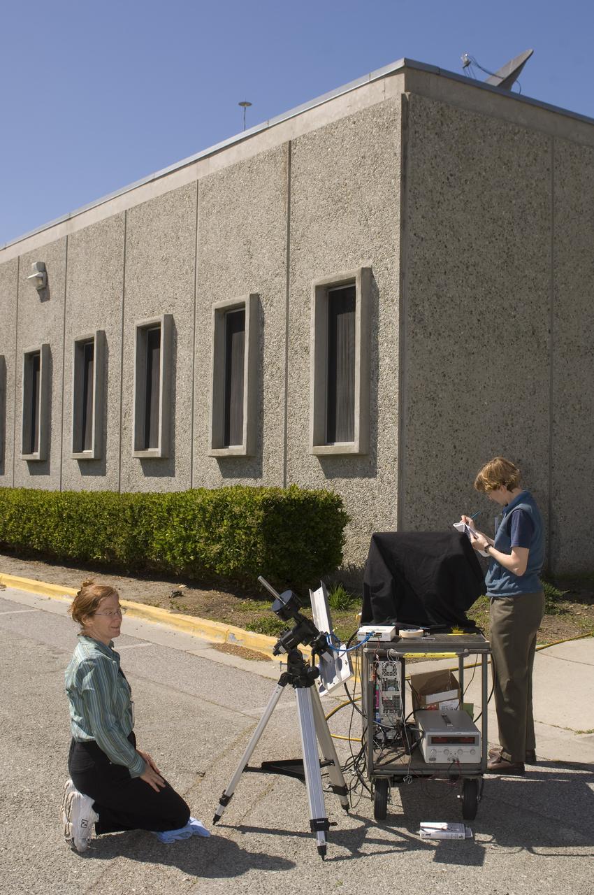Lunar CRater Observation and Sensing Satellite (LCROSS) and P.I. at NASA Ames Research Center - Calibration of Polychromix Near Infra Red Spectrometer outside of N-240A (EEL) with (l to r)) Kim Ennico, Dana Lynch, and Diane Wooden