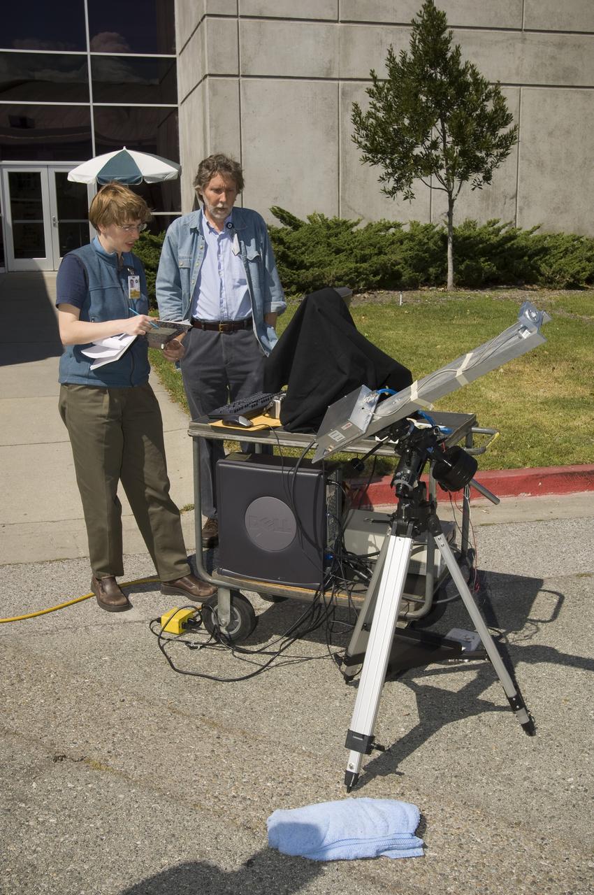 Lunar CRater Observation and Sensing Satellite (LCROSS) and P.I. at NASA Ames Research Center - Calibration of Polychromix Near Infra Red Spectrometer outside of N-240A (EEL) with (l to r)) Kim Ennico,  Dana Lynch, and Diane Wooden