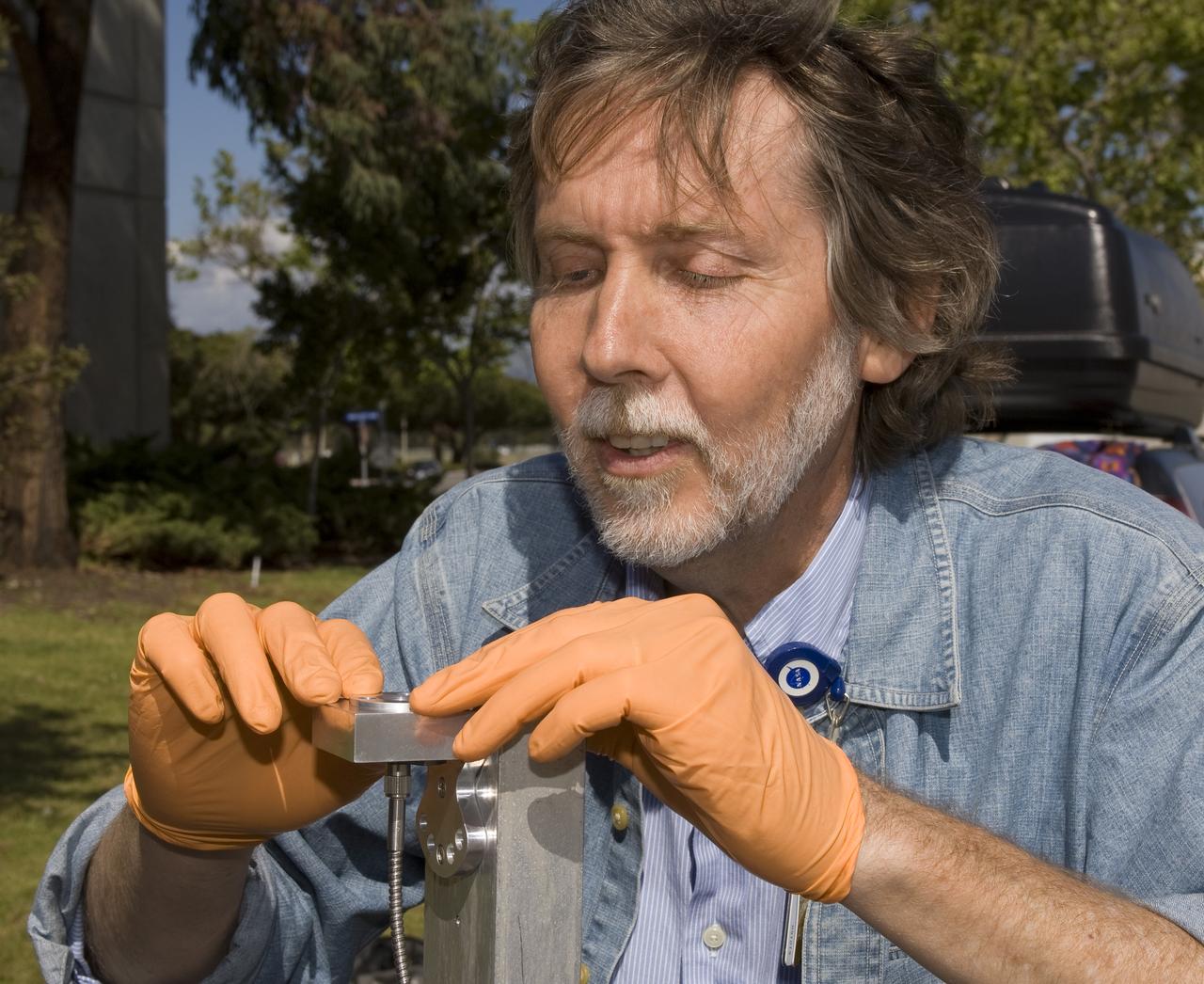 Lunar CRater Observation and Sensing Satellite (LCROSS) and P.I. at NASA Ames Research Center - Calibration of Polychromix Near Infra Red Spectrometer outside n-240 (EEL) with Dana Lynch