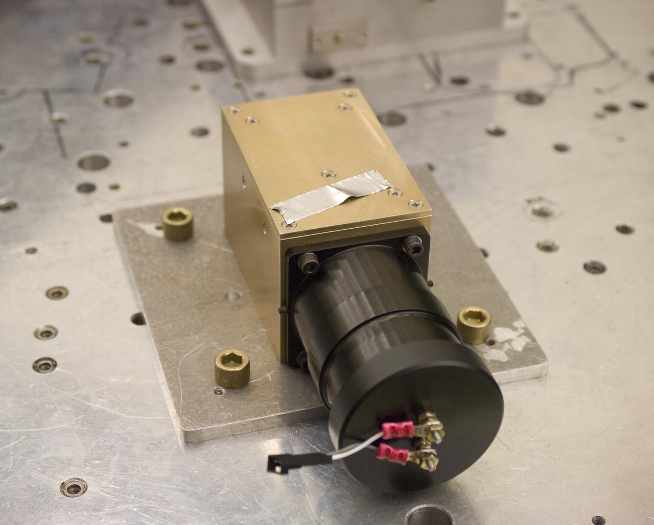 Lunar CRater Observation and Sensing Satellite (LCROSS) and P.I. at NASA Ames Research Center - close up of Total Luminance Photometer lens and electronics units on shake table in N-2444 EEL Laboratory