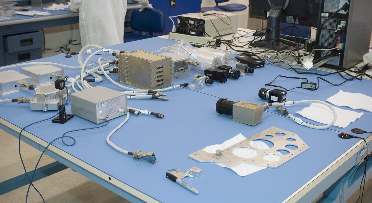 LCROSS flight hardware in clean room at Ames N-240. with P.I.'s and EEL personnel preforming various tests