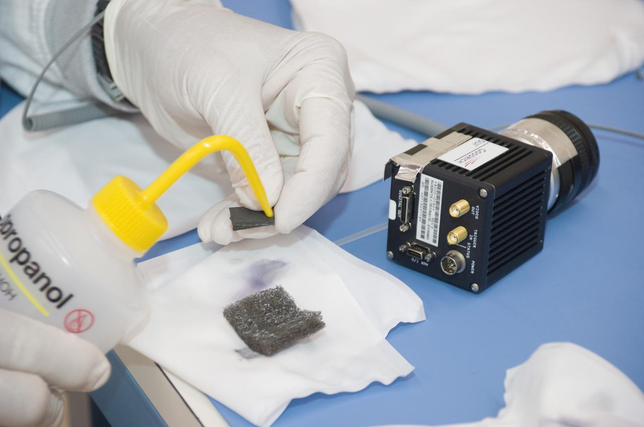 LCROSS flight hardware in clean room at Ames N-240. with P.I.'s and EEL personnel preforming various tests