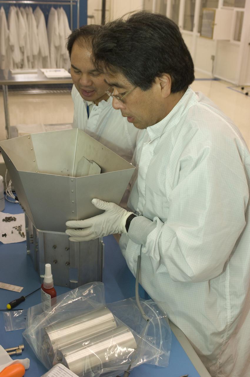 LCROSS flight hardware in clean room at Ames N-240. EEL personnel fabricating & assembling components with Glen Sasaki  of Ames, Engineering Evaluation lab