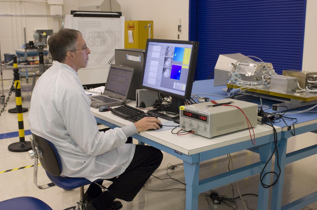 LCROSS flight hardware in clean room at Ames N-240. with P.I.'s and EEL personnel preforming various tests with Mark Shirley, LCROSS Northrup Grumman Redondo Beach, CA