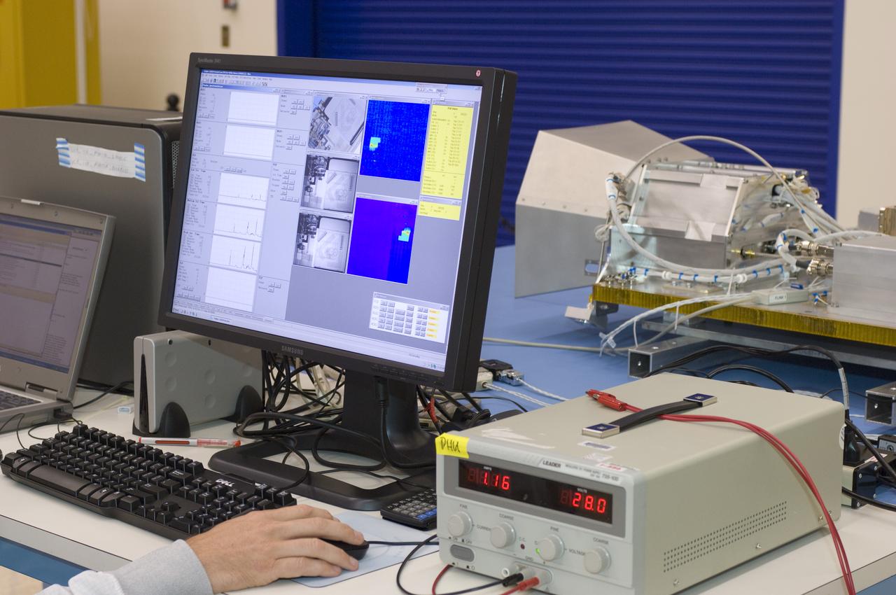 LCROSS flight hardware in clean room at Ames N-240. with P.I.'s and EEL personnel preforming various tests