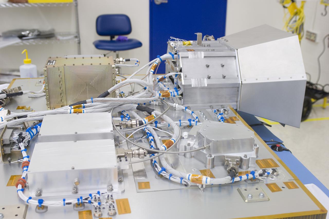 LCROSS in Ames clean room  N-240 - Jerry Wang (L) and Glen Sasaki securing all parts