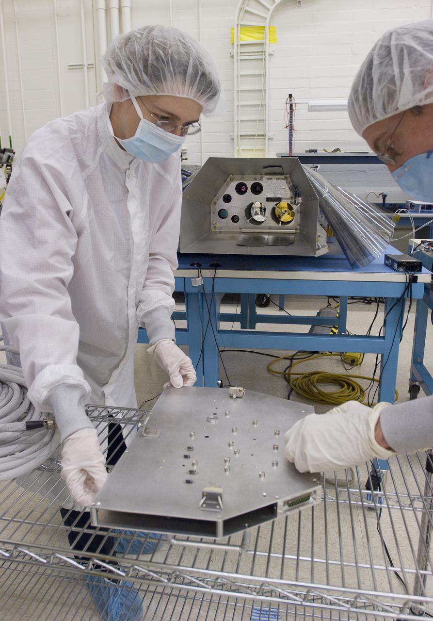 LCROSS in Ames Clean room N-240 - calibration and camera check out wit Kim Ennico (l) and Mark Shirley, Northrup Grumman Redondo Beach, CA remove rear cover