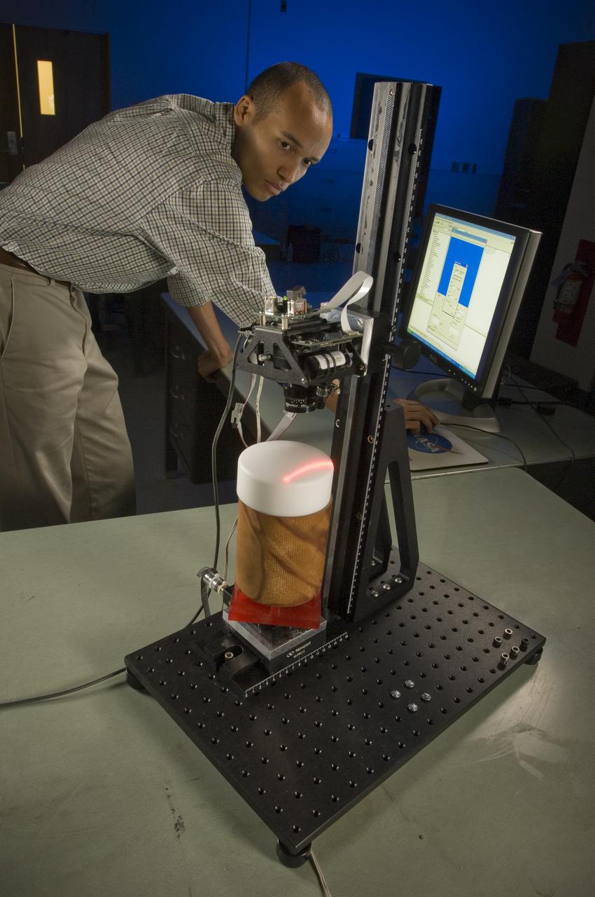 Desk top scanner used to inspect Orion Heat Schield Materials with Mike Derouen