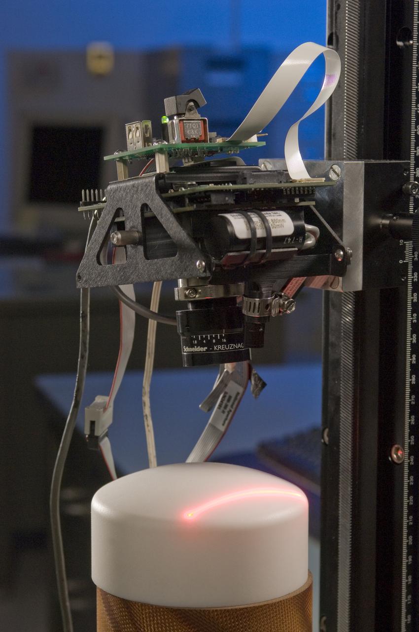 Desk top scanner used to inspect Orion Heat Schield Materials with Mike Derouen