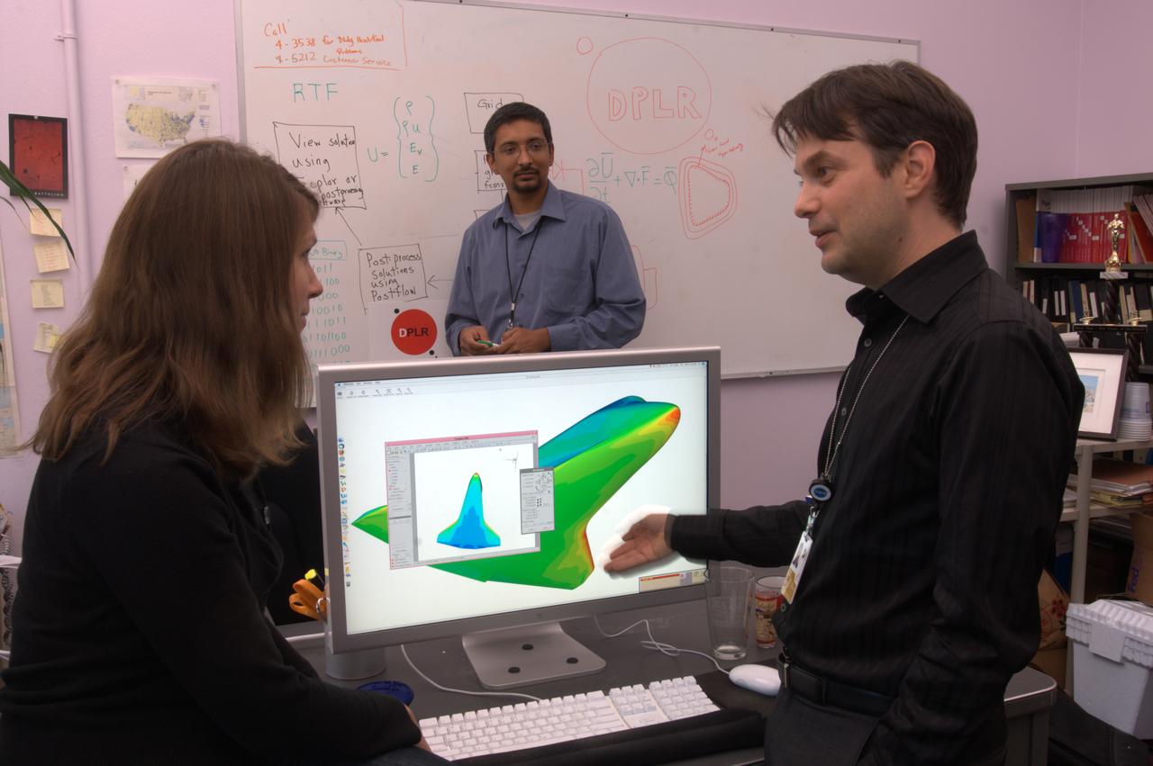 From left: Data Parallel Line Relaxation (DPLR) software team members Kerry Trumble, Deepak Bose and David Hash analyze and predict the extreme environments NASA's space shuttle experiences during its super high-speed reentry into Earthâ€™s atmosphere.