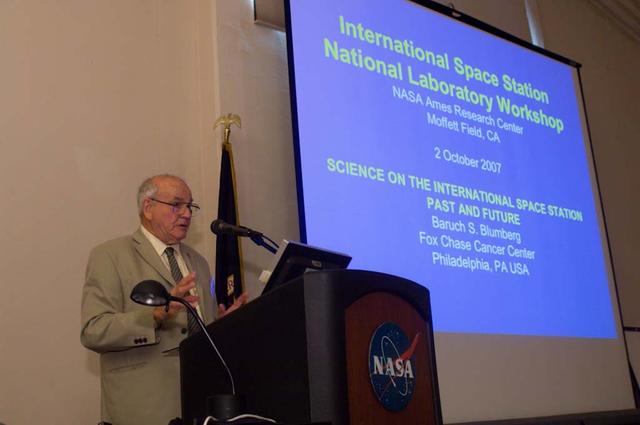 International Space Station (ISS) National Laboratory Workshop held at the NASA Ames Research Center, Moffett Field, CA .  Baruch S. Blumberg at podium.