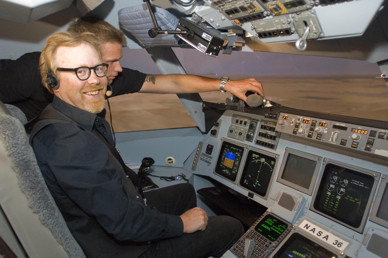 Mythbusters TV in Ames CVSRF Simulator  with Discovery Channel show hosts Adam Savage (black shirt) and Jamie Hyneman (white shirt) inside simulator cab.