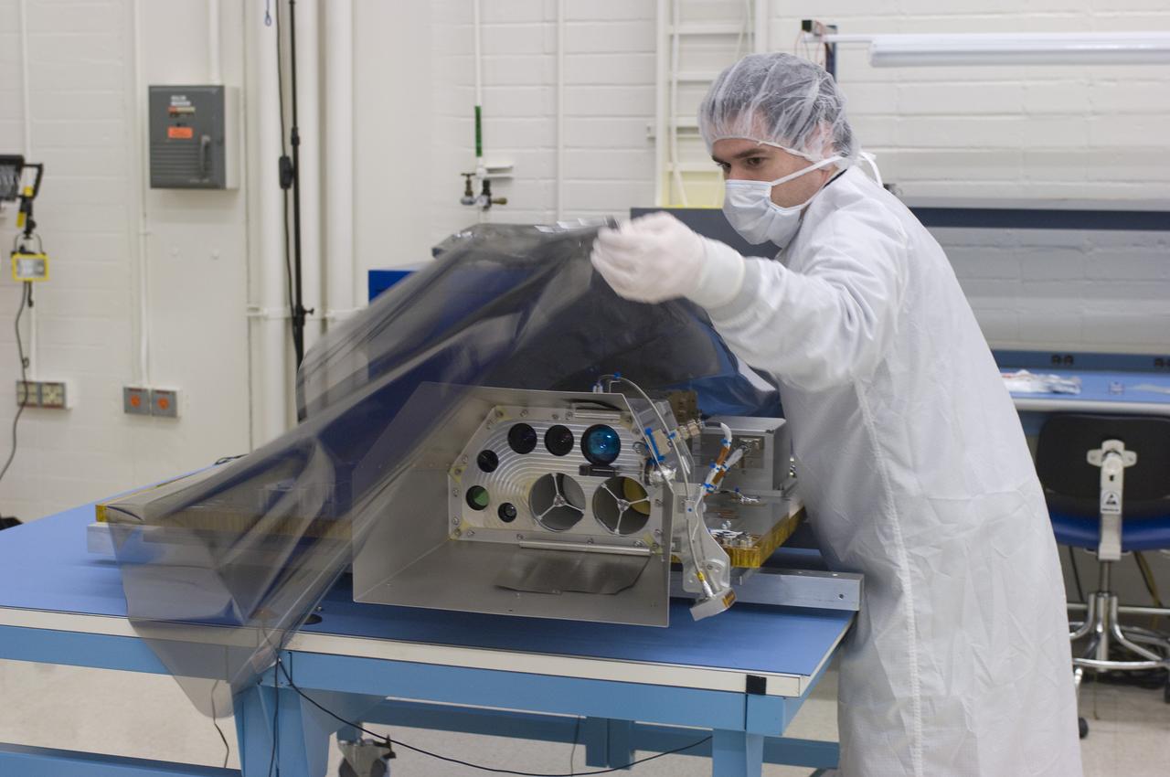 LCROSS in Ames clean room N-240- cleaning and wrapping for transfer to Northrup Grumman Redondo Beach, CA where more calibration will be done before finally being sent for mating with the LRO spacecraft (with Tony Colaprete)